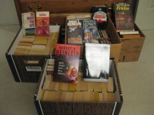 These are containers of books ready to go into shipping boxes.  Yes, these are all Heinleins.  These smaller boxes are carried to the area where we box for shipment.